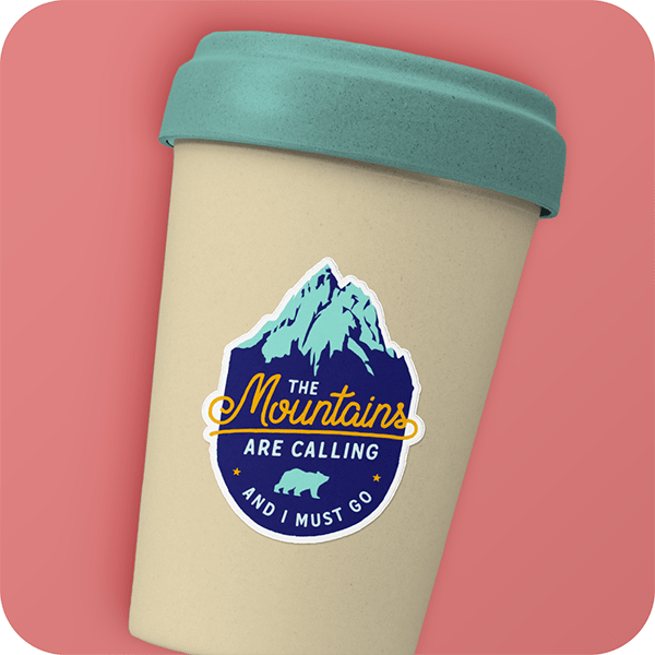 Mug with a mountain sticker on it