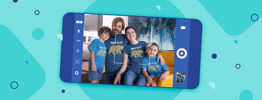 Mother, father, son and daughter wearing matching family outfits with inspirational quote designs.